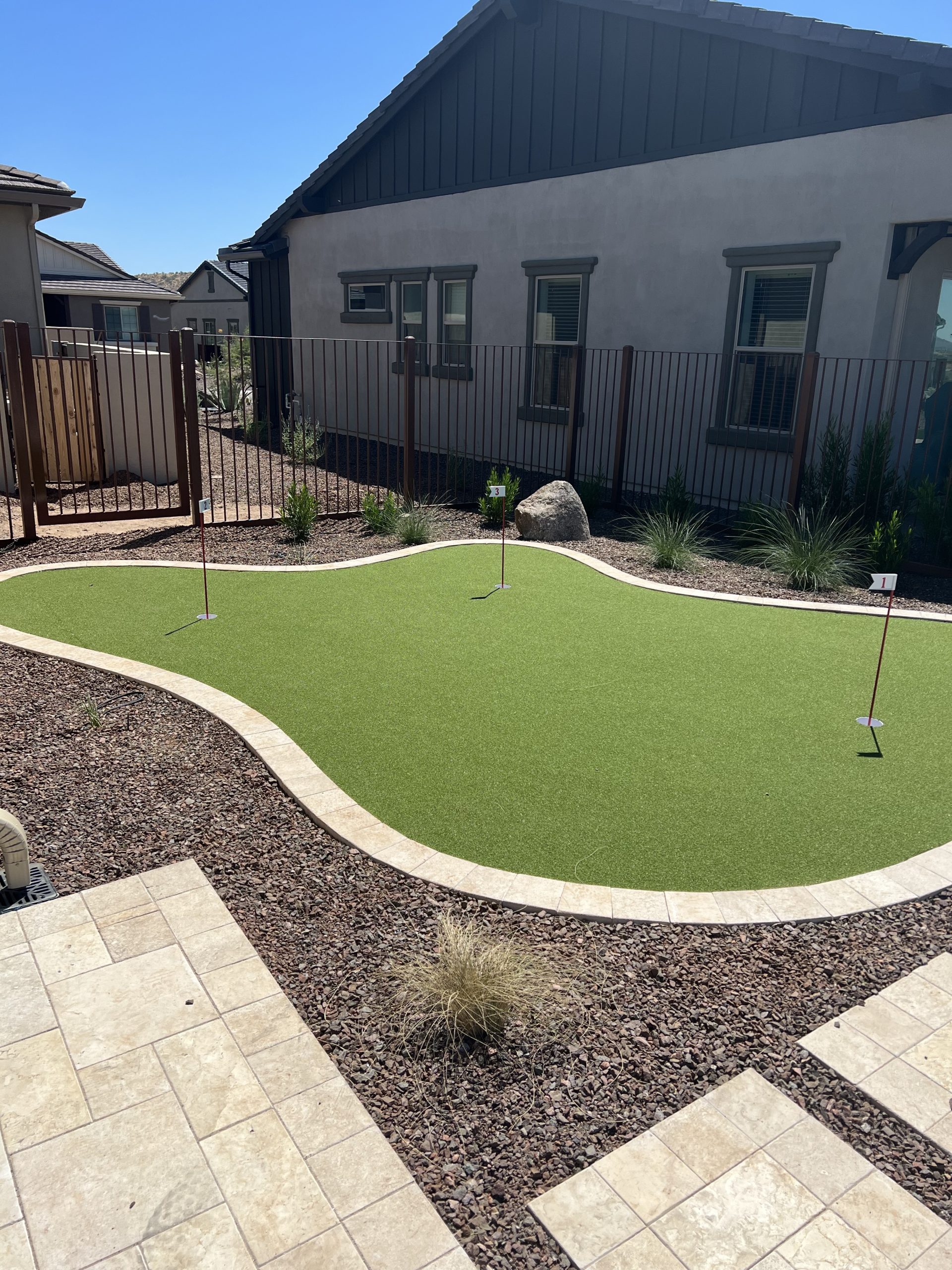 Backyard,Putting,Green,With,Three,Holes